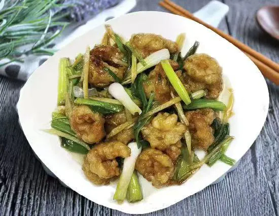 Crispy chicken stir-fried with scallions in savory sauce at Lucky Garden, a Chinese Restaurant in Methuen